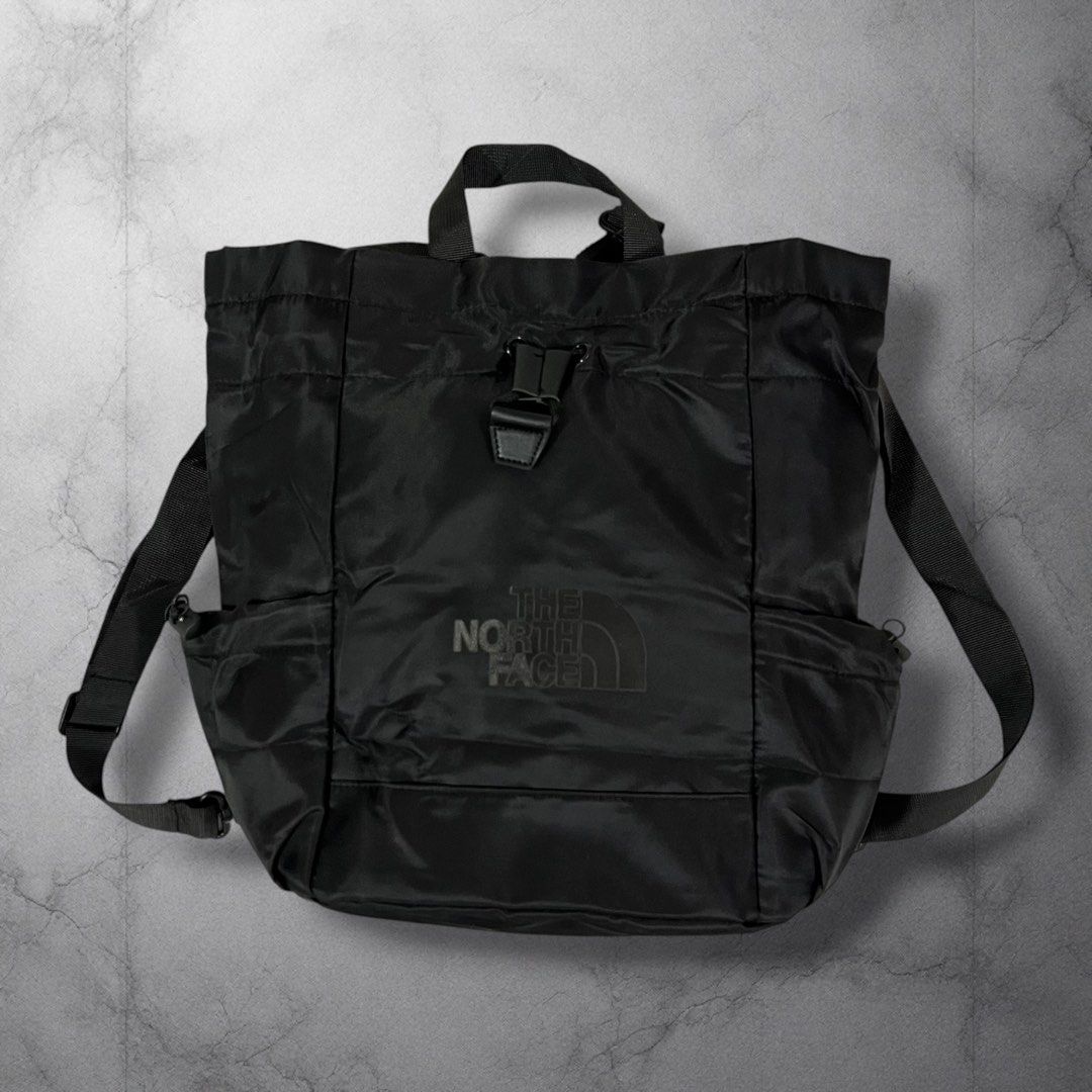 The North Face Black Tote Backpack (Category: Backpacks) located in Cavite. Submitted by itsayaaa (Listing ID 1455613570, Image 1). Description: - Brand: The North Face - Color: Black - Type: Tote Backpack - Material: 100% Polyester - Features: Side pockets, buckle closure - Versatile: Can be worn as a backpack or a tote - Ideal for: Everyday use, travel.