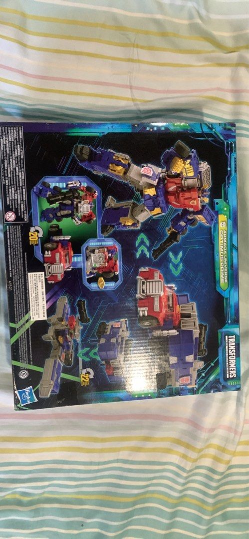 Transformers Legacy Evolution Armada Universe Optimus Prime Toy (Category: Action & Battle Toys) located in Quezon City. Submitted by joeacad2003 (Listing ID 1455652589, Image 2). Description: - Large Transformers Legacy Evolution Armada Universe Optimus Prime action figure. - Transforms into different modes. - Includes original box. - Ideal for collectors and fans of the Transformers series..