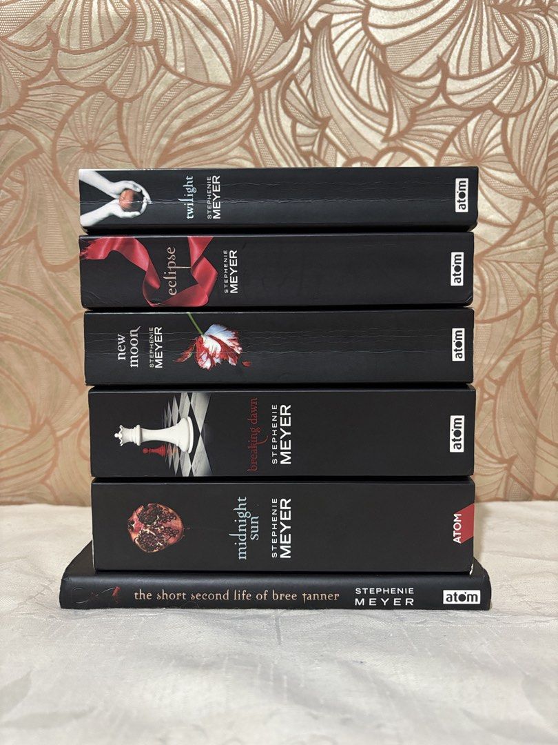 Twilight Saga Books Set by Stephenie Meyer (Category: Storybooks) located in Manila. Submitted by rosewood.collectionz (Listing ID 1455618728, Image 1). Description: - Complete set of The Twilight Saga by Stephenie Meyer - Includes: Twilight, New Moon, Eclipse, Breaking Dawn, and Midnight Sun - Bonus: The Short Second Life of Bree Tanner - All books are paperback - Ideal for fans of the series.