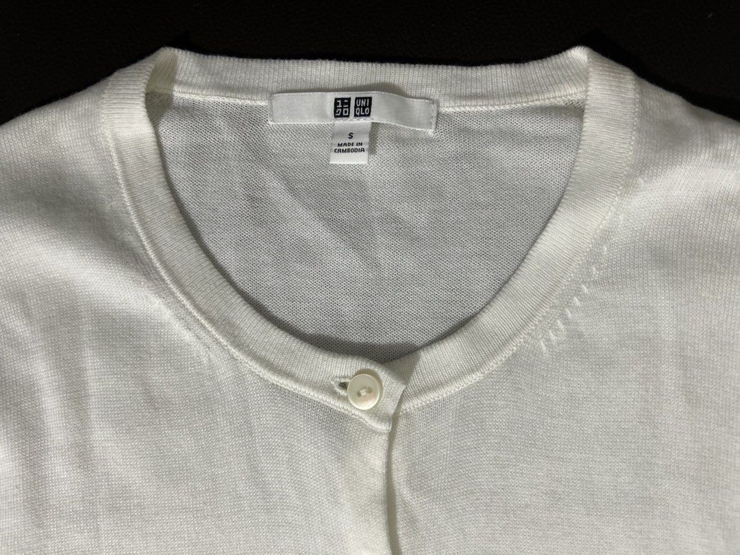Uniqlo Cardigan (Category: Others Tops) located in Marikina City. Submitted by decluttering.matters (Listing ID 1455508611, Image 2). Description: Authentic Uniqlo Off-White Cardigan. Size Small Hindi po makapal ang tela, best pang patong sa blouse or dress. Used once but stored in the closet for a long time kaya may small yellow spots sa sleeves (see last photo). Hindi halos halata at baka kaya pa matanggal kapag nilabahan. No reservations. Paym
