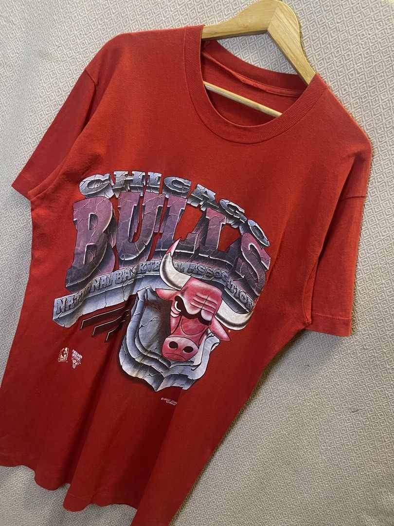 Vintage 90s chicago bulls tee (Category: Tshirts & Polo Shirts ) located in Manila. Submitted by hypestock_mnl (Listing ID 1455545667, Image 2). Description: - stylish - perfect for casual wear - great fit - in good condition - minimal signs of usage - 9/10 - in solid condition! - lints - money worth! - see pics for details/issue.