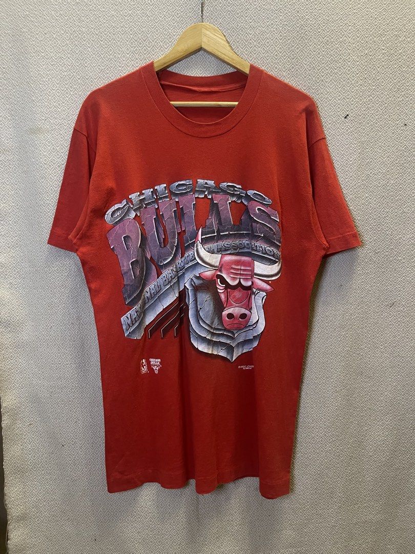 Vintage 90s chicago bulls tee (Category: Tshirts & Polo Shirts ) located in Manila. Submitted by hypestock_mnl (Listing ID 1455545667, Image 1). Description: - stylish - perfect for casual wear - great fit - in good condition - minimal signs of usage - 9/10 - in solid condition! - lints - money worth! - see pics for details/issue.