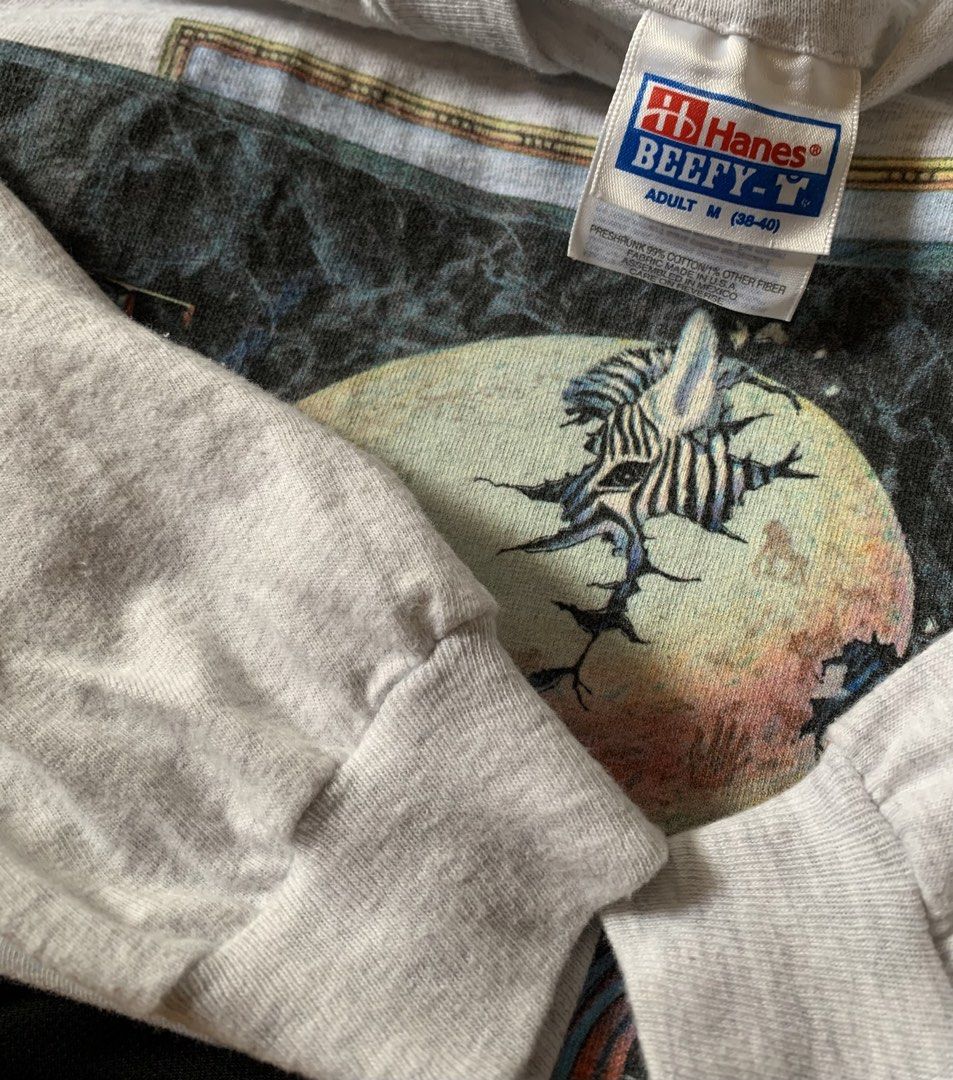 VINTAGE ART TEE FOR SALE (Category: Tshirts & Polo Shirts ) located in Angeles City. Submitted by browsetheracks (Listing ID 1455615593, Image 1). Description: FOR SALE RARE 1994 SERIGRAPHIA GRAPHIC ART TEE 🎨 SIZE M ON A HANES BEEFY TAG (21×28) FITS LARGE MADE WITH BEEFY COTTON MATERIAL IN EXCELLENT CONDITION ✓ NO ISSUE ₱1100+SHIPPING FEE DM ME FOR MORE INFO 🔌 Note: Every item is photographed accurately to showcase its actual condition. Before 