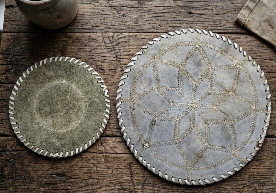 Vintage Artisan Handcrafted Patchwork Cowhide Table Mat & Trivet Set Authentic Leather Accent Duo (Category: Other Kitchenware & Tableware) located in Tagaytay City. Submitted by barenwolf (Listing ID 1455583268, Image 3). Description: A one-of-a-kind vintage treasure that seamlessly combines rustic charm with everyday utility. Crafted from genuine hair-on cowhide, this matched duo features a striking geometric starburst centerpiece mat and a coo