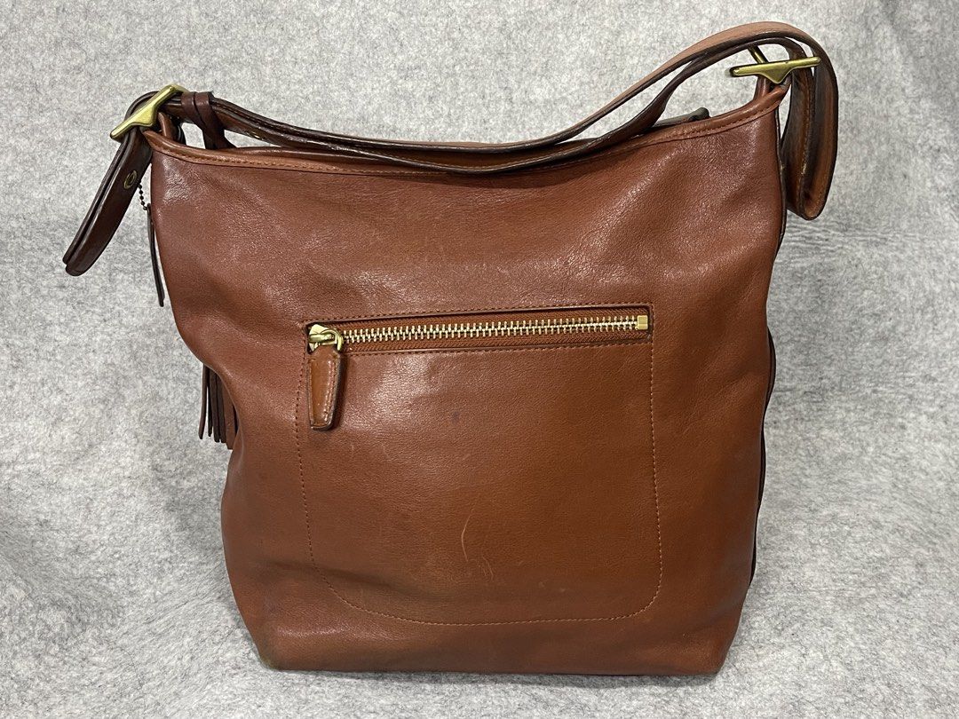 vintage coach leather bag (Category: Shoulder Bags) located in Calamba. Submitted by thriftingoverload (Listing ID 1455593061, Image 3). Description: plus shipping fee may rubs at scratches na xa.