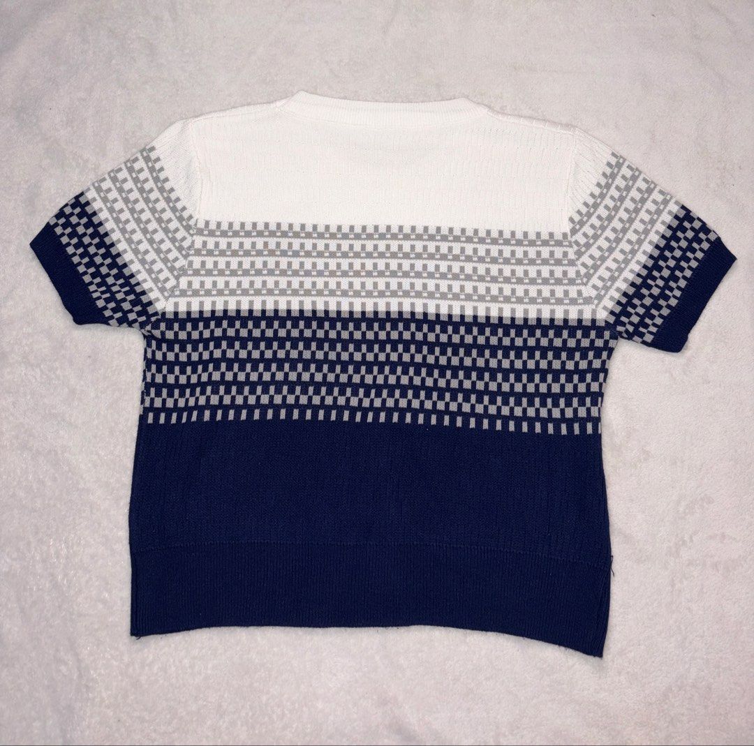 White Navy Grey Patterned Short Sleeve Knit Top (Category: Blouses) located in Taguig. Submitted by aclarecorner (Listing ID 1455526220, Image 2). Description: Cute short sleeve knit top with white base and grey/navy patterned bands..