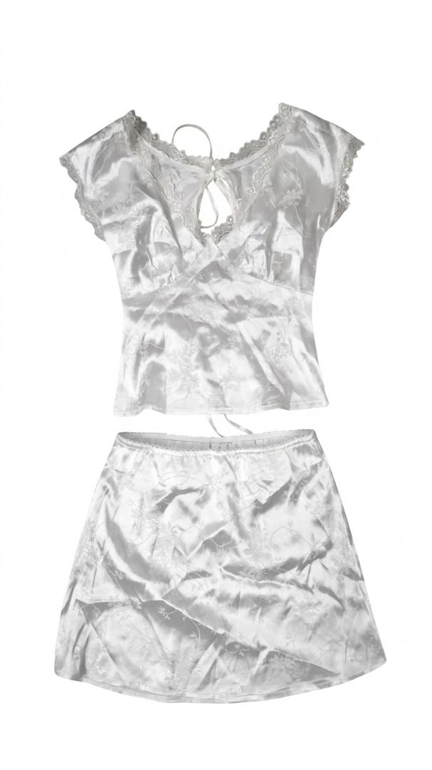 White Satin Lace Two-Piece Co-Ord Set (Category: Skirts) located in San Juan City. Submitted by trueocean.b90bcf (Listing ID 1455636185, Image 1). Description: Style: 2-piece matching set (cap-sleeve babydoll top and fluid mini skirt) Color: Pure white / pearl ivory Features: Top designed with scalloped lace trimming along the V-neckline and flutter sleeve cuffs, a subtle front keyhole accent with delicate string ties, and a flared hem; skirt fea