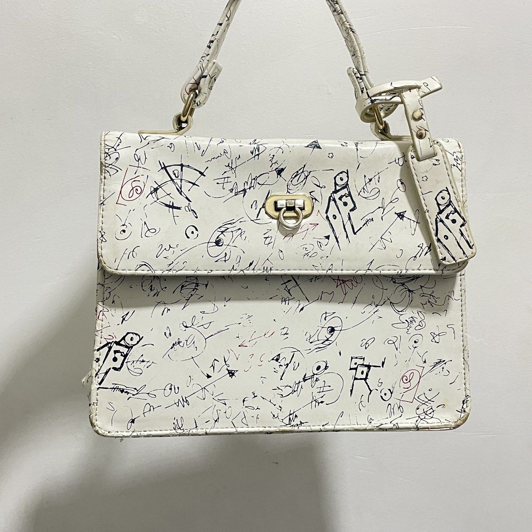 WOMEN’S PRINT HANDBAG (Category: Luxury Bags & Wallets) located in Manila. Submitted by chyo.se (Listing ID 1455590105, Image 1). Description: preloved premium onhand gagalangin, tondo manila lalamove, j&t or meet-up gcash (pf) or cash (mu) .