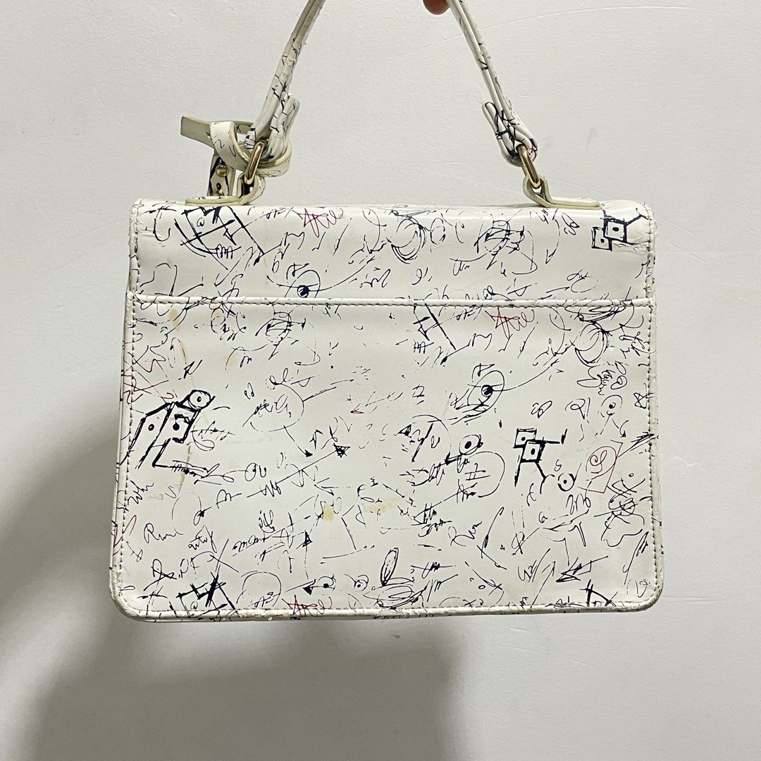 WOMEN’S PRINT HANDBAG (Category: Luxury Bags & Wallets) located in Manila. Submitted by chyo.se (Listing ID 1455590105, Image 2). Description: preloved premium onhand gagalangin, tondo manila lalamove, j&t or meet-up gcash (pf) or cash (mu) .