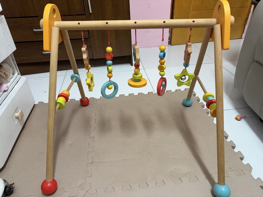Wooden Play Gym (Category: Infant Playtime) located in Manila. Submitted by barbie.closet (Listing ID 1455542047, Image 1). Description: Wooden Play Gym Used but not abused. With minimal sign of usage Rfs: Outgrown by my baby.