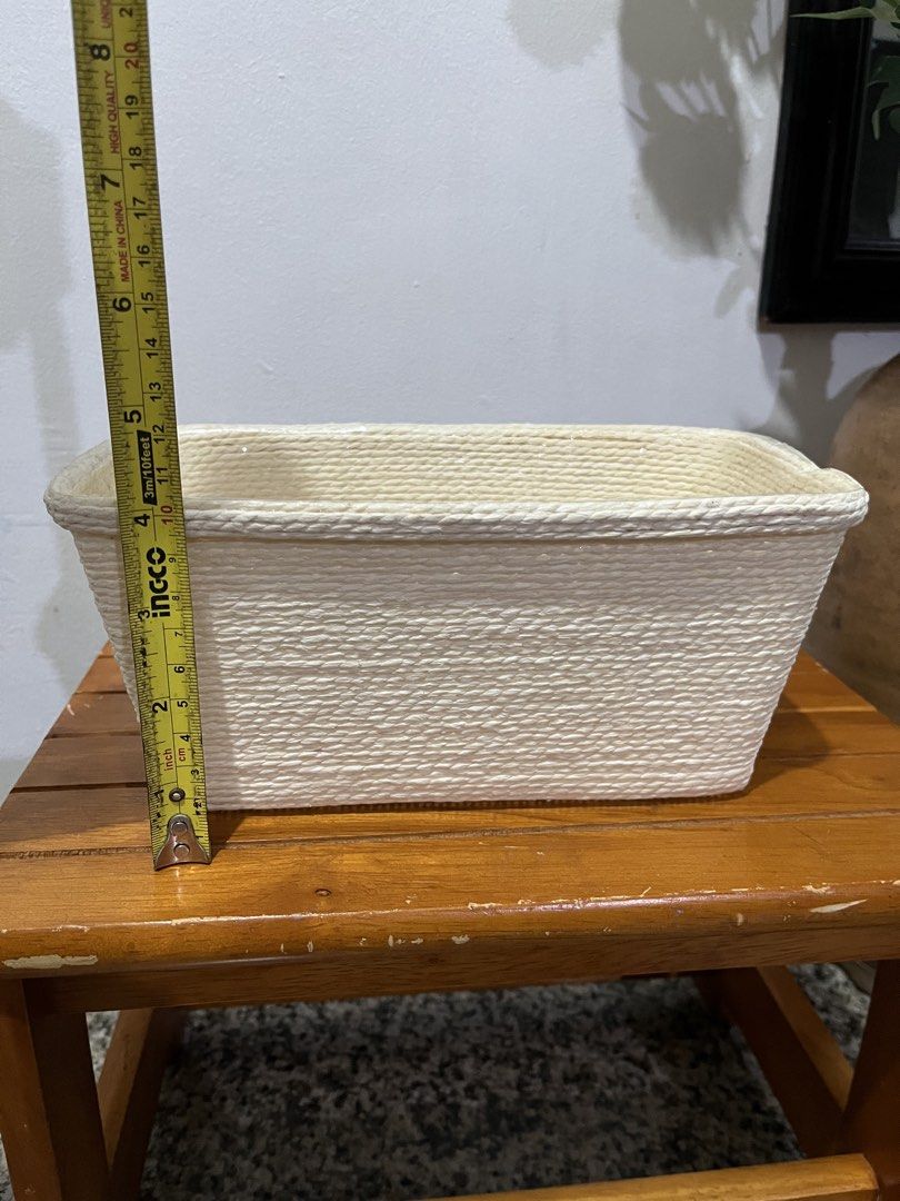 Woven Rectangular Storage Basket (Category: Storage Boxes & Baskets) located in Taguig. Submitted by minmin_parker (Listing ID 1455657744, Image 2). Description: - Great size for organizing - Textured rope design all around - Neutral color matches any decor - Use for storage on shelves - Can be used as a planter cover - Versatile piece for any room.