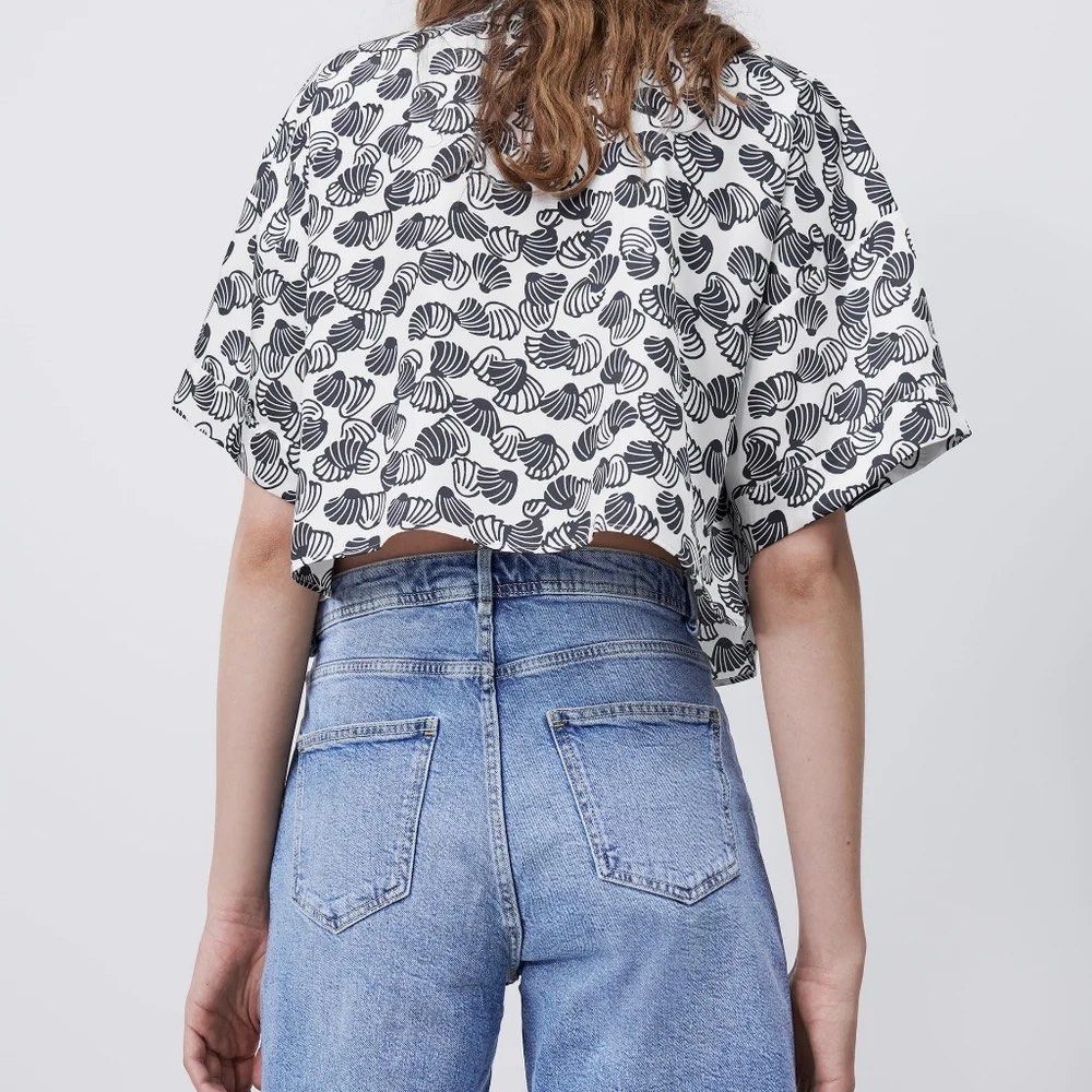 ZARA - Silk Shell Print Crop-Top Polo (Category: Shirts) located in Cavite. Submitted by hand.picked (Listing ID 1455618814, Image 2). Description: ZARA - Silk Shell Print Crop-Top Polo Size: Small Measurement: 20” Width / 18” Length Condition: Like New.