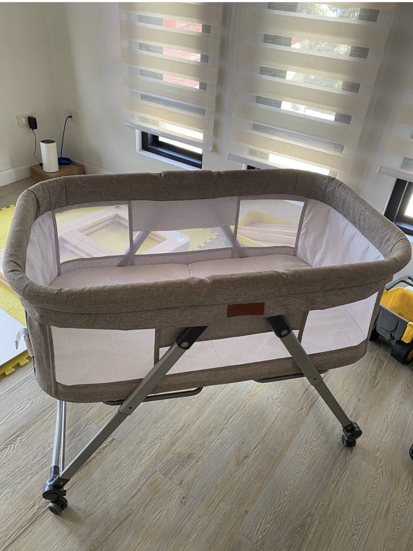 Adjustable Baby Bassinet with Wheels and Mosquito Net (Category: Cots & Cribs) located in Paranaque City. Submitted by shopwhattinaloves (Listing ID 1455812295, Image 1). Description: - Portable baby bassinet for easy transport - Adjustable height from 53cm to 76cm - Folds down to a compact 20cm for convenient storage - Built-in wheels for effortless mobility - Comes with a mosquito net for added protection - Perfect for keeping your baby close b