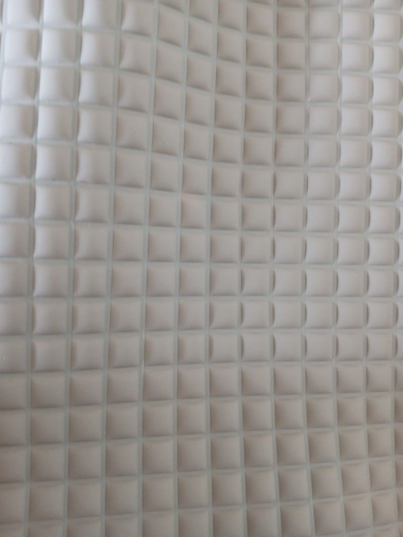 Air Filled Diaper Changing/ Pee Pad (Category: Changing Mats & Accessories) located in Manila. Submitted by relaxlang (Listing ID 1455726432, Image 1). Description: Air-filled rubber changing mat (or rubber baby pee pad/sheet). 36.5 x 23.5 Key Features: Material: Made of soft, natural rubber with tiny air-filled bubbles. Design: Features a distinct square waffle/grid texture that provides cushioning and prevents sticking. Function: It is complete