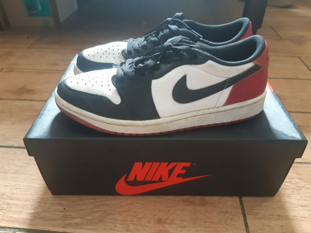 Air Jordan 1 Retro Low OG "Chicago" (Category: Sneakers) located in Angeles City. Submitted by low_123 (Listing ID 1455698446, Image 2). Description: - Colorway: Black, White, and Red - Condition: Rarely Used - Includes original box .