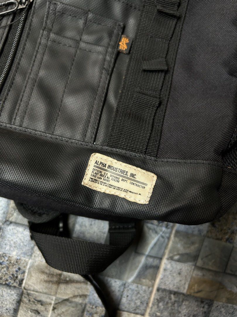 Alpha Industries 3-way black tactical tote bag / Backpack (Category: Backpacks) located in Quezon City. Submitted by commonwealthpickerph (Listing ID 1455759360, Image 3). Description: Alpha Industries 3-way black tactical tote bag / Backpack - 18.5 width // 17 length - can fit any laptop - In excellent condition - 9.3/10 color rate and condition - has minor sign of used .