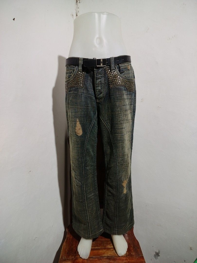 Antik Denim Studded Skull Jeans (Category: Jeans) located in Clarin. Submitted by thriftfinds.2026 (Listing ID 1455794698, Image 1). Description: - Cool Antik Denim jeans - Large studded skull design on right leg - Studded detailing on front pockets - Distressed look with rips - Unique back pocket embroidery - Belt included - Flare leg style.