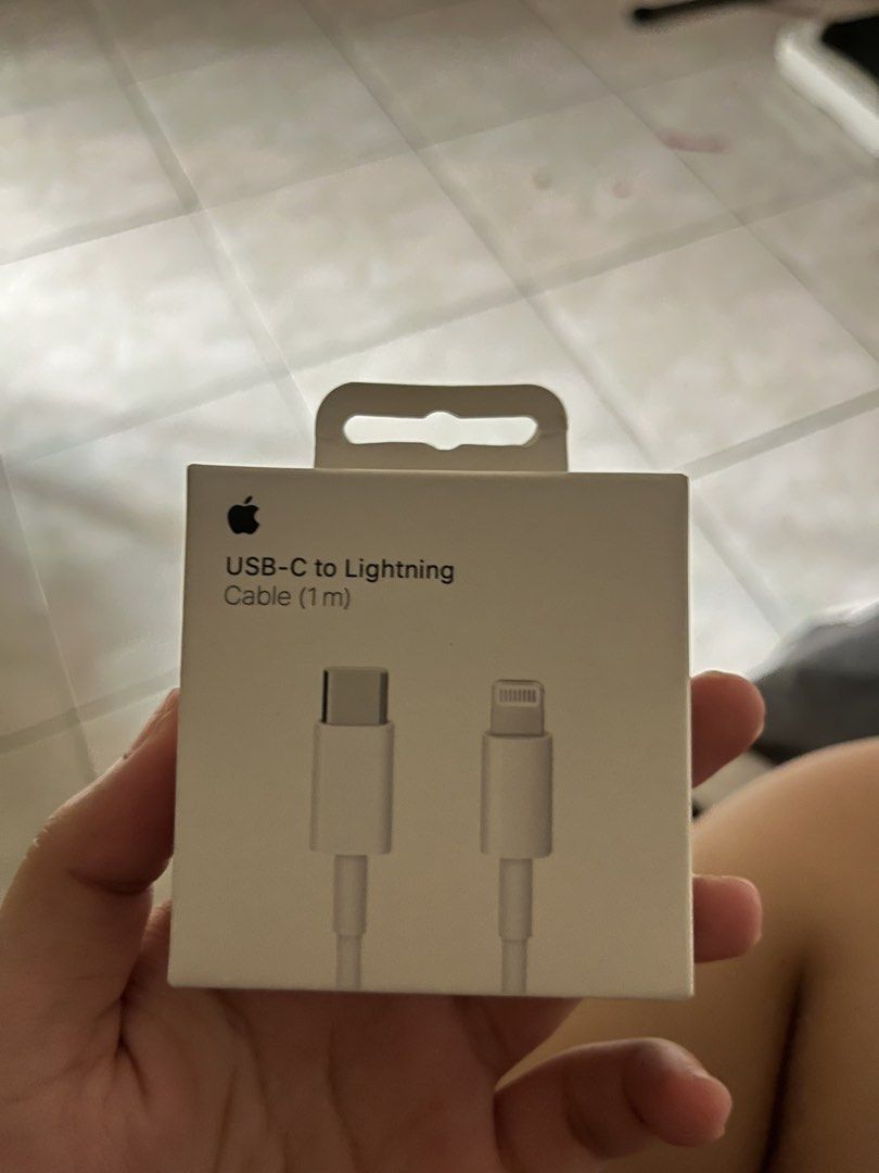 Apple charging cable and adapter (Category: Cables & Adaptors) located in Marikina City. Submitted by brightfish.f4dd75 (Listing ID 1455823943, Image 1). Description: Brand new Authentic With box Spare Binuksan lang to check if working.