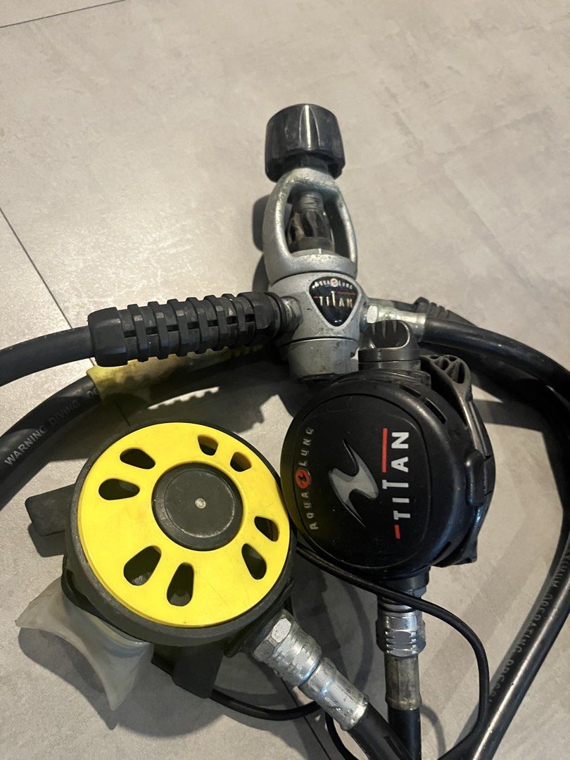 Aqua Lung Titan Scuba Diving Regulator Set with SPG (Category: Other Sports Equipment and Supplies) located in Makati City. Submitted by blackbimmer (Listing ID 1455760122, Image 2). Description: - Used Aqua Lung Titan regulator set - Includes: First stage, second stage, and submersible pressure gauge (SPG) - Ready for your next dive - Shows minor cosmetic wear from normal user - compass is “foggy” - had the Reg and octopus serviced before I stor