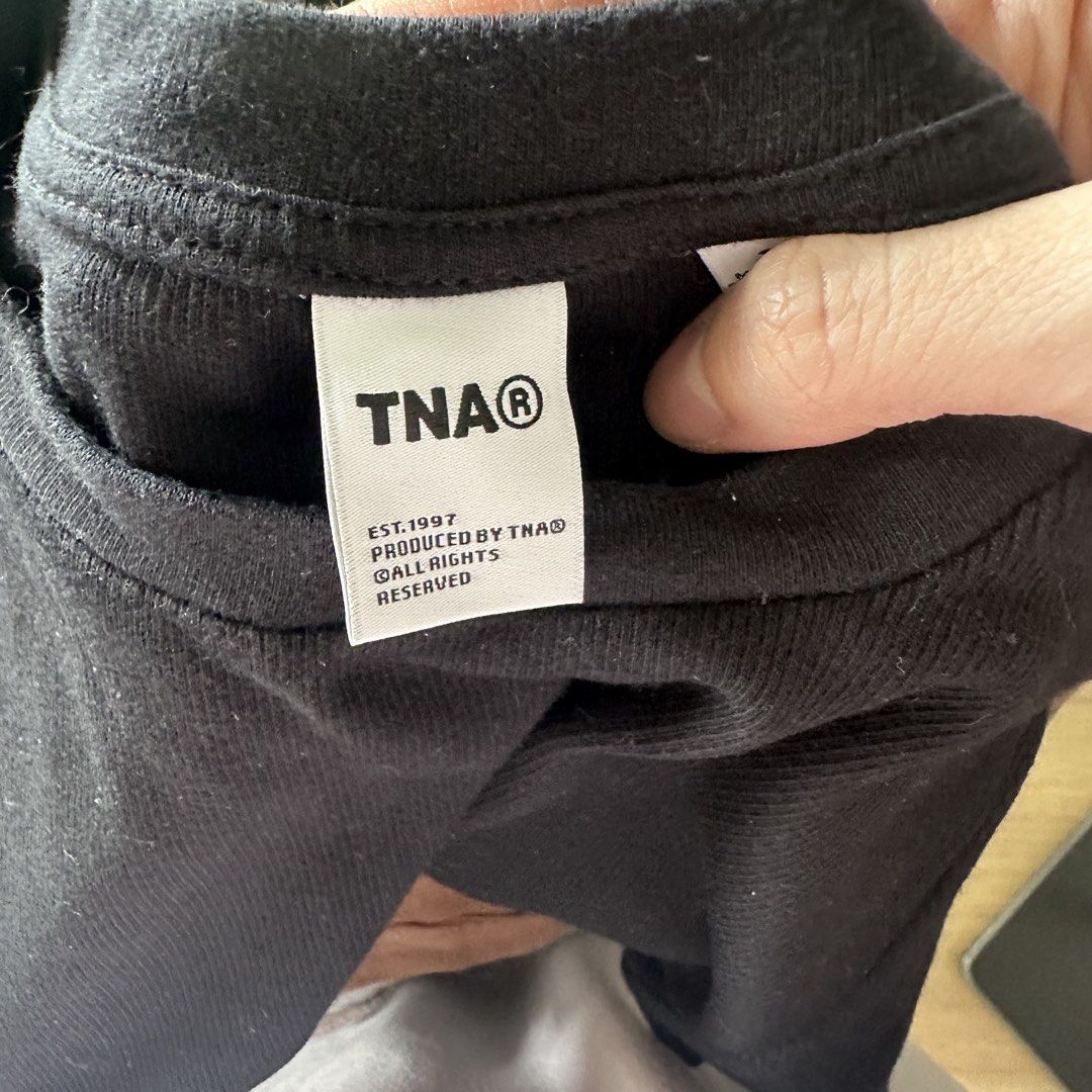 Aritzia x TNA fitted black shirt (Category: Others Tops) located in Pasig City. Submitted by ynahperez (Listing ID 1455750124, Image 2). Description: .