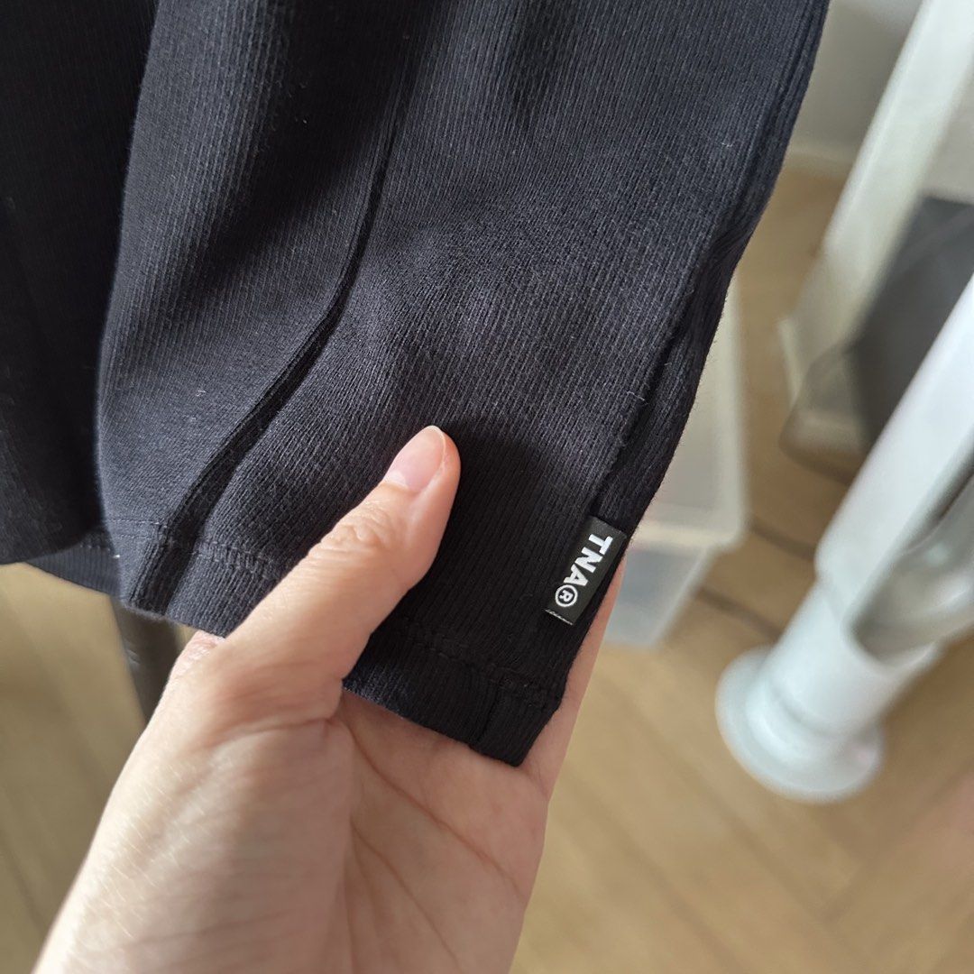 Aritzia x TNA fitted black shirt (Category: Others Tops) located in Pasig City. Submitted by ynahperez (Listing ID 1455750124, Image 3). Description: .
