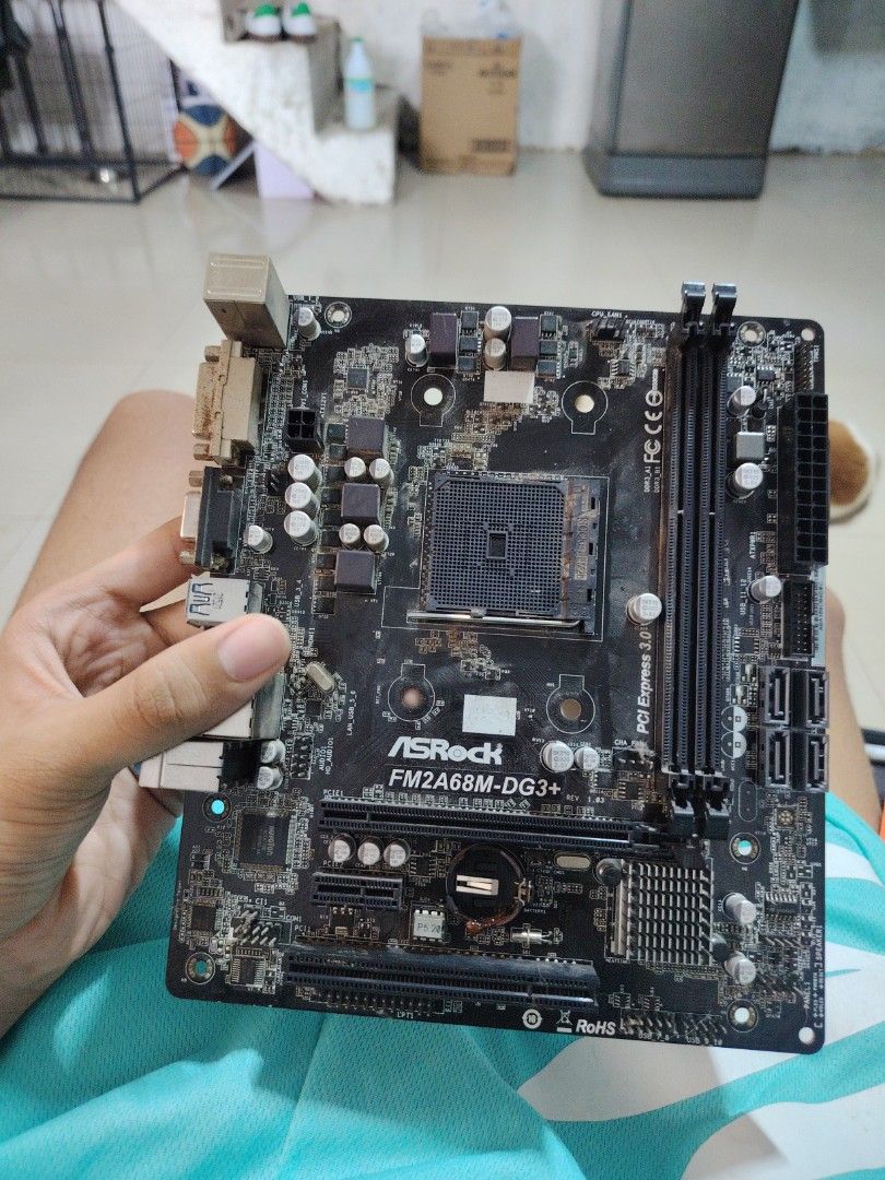 Asrock fm2a68m-dg3+ (Category: Computer Parts) located in Manila. Submitted by silvercat_f02f48 (Listing ID 1455700141, Image 1). Description: it has missing screws and parts but the motherboard is alright.
