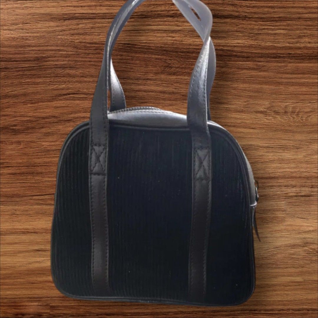 Auth Dolce & Gabbana Curduroy n' Leather Bag (Category: Luxury Bags & Wallets) located in Cebu City. Submitted by jc_online_shop (Listing ID 1455723350, Image 3). Description: 10" x 12" x 3" dark choco color curduroy and genuine leather material zip closure with hologram sticker Made in Italy.