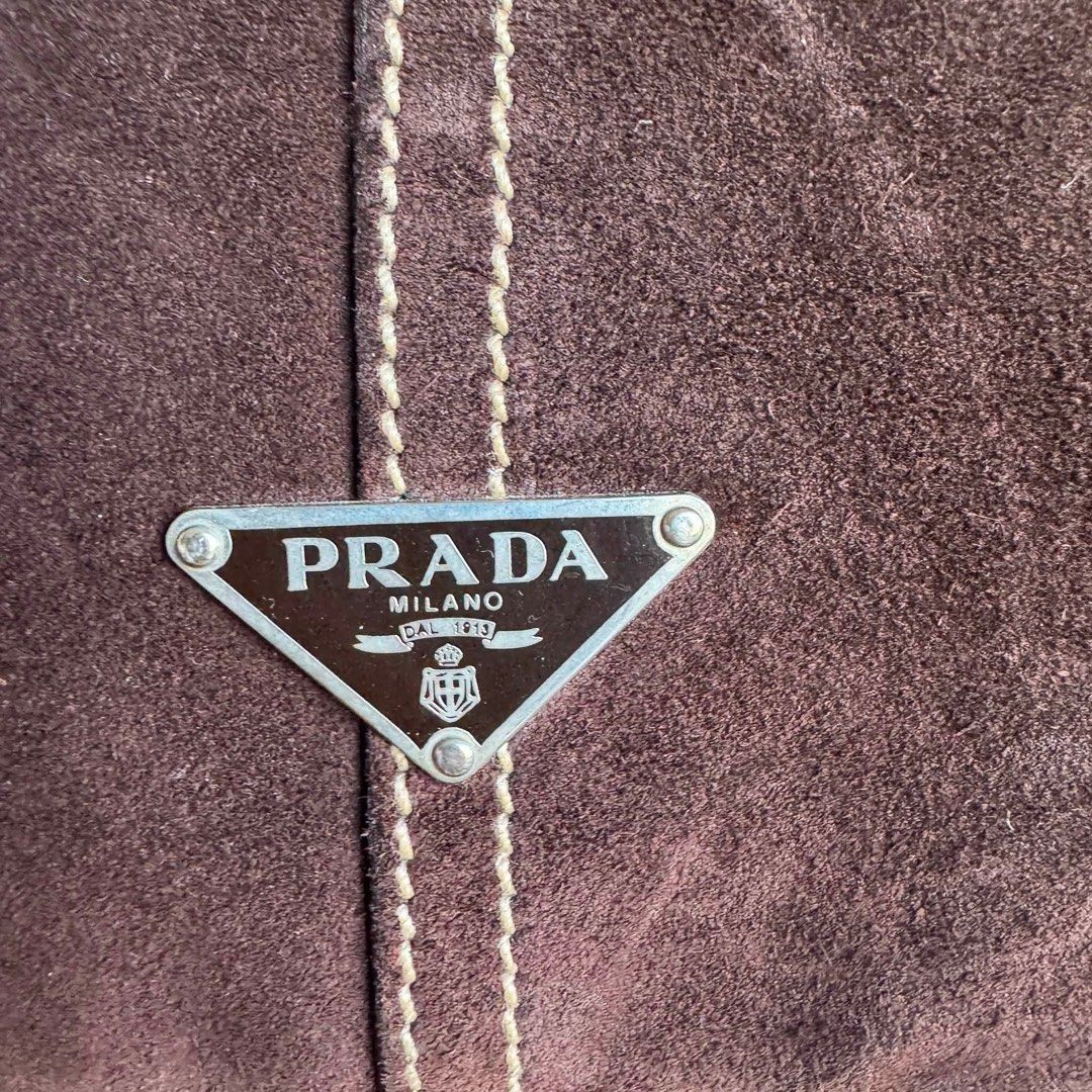 Authentic Prada suede hobo bag (Category: Luxury Bags & Wallets) located in Quezon City. Submitted by jhaediah (Listing ID 1455675033, Image 3). Description: ‼️LOW PRICE ALERT‼️ Prada suede hobo bag Perfect for y2k girlies In very good condition With few scratches only First to pay basis ✨.