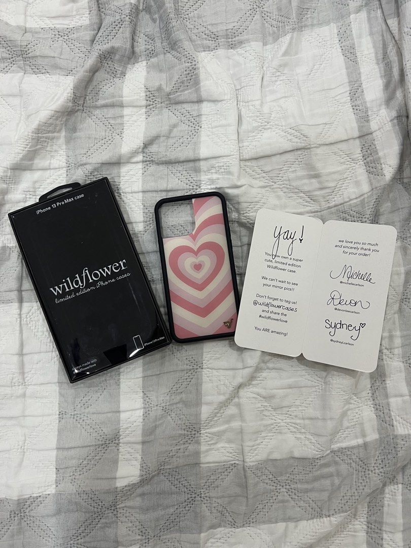 Authentic Wildflower iPhone 13 Pro Max Case (Category: Cases & Sleeves) located in Manila. Submitted by chesbedumb (Listing ID 1455800762, Image 3). Description: Authentic Wildflower phone case for iPhone 13 Pro Max - cute pink heart design - comes with original Wildflower box - includes original thank-you card - no major damages - price is negotiable! rfs: decluttering location: manila i can provide additional photos/videos available upon reques