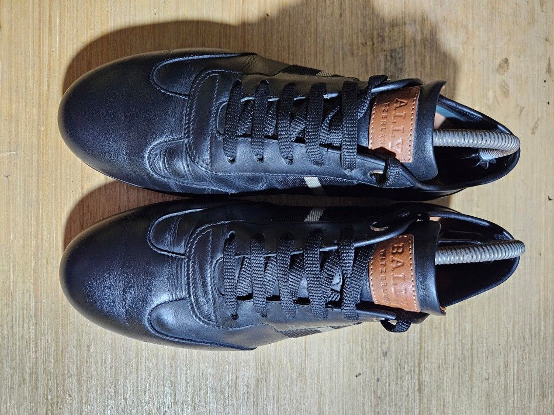 Bally Black Leather Shoes Size 8M (Category: Casual Shoes) located in Valenzuela. Submitted by _myperfectstuff (Listing ID 1455687954, Image 1). Description: - Genuine black leather Bally sneakers - Features the iconic Bally stripe detail. - Comes with original shoe trees - Perfect for both casual outings and adding a touch of class to your outfit - Timeless Bally design.