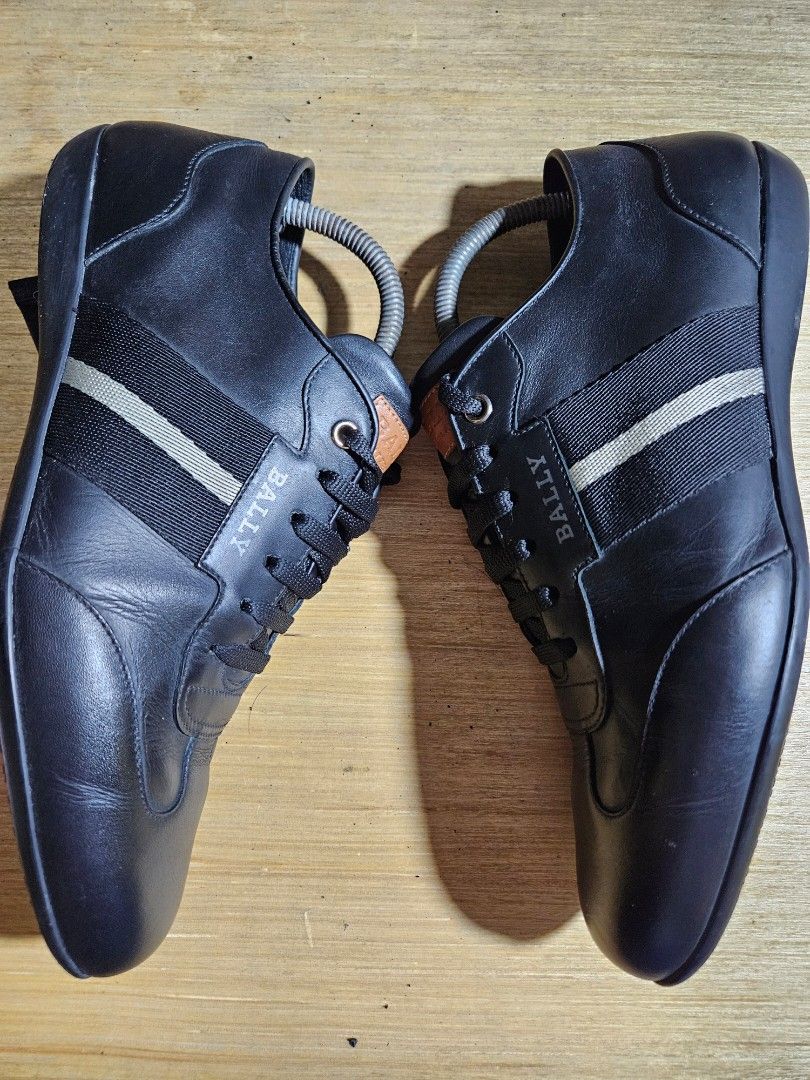 Bally Black Leather Shoes Size 8M (Category: Casual Shoes) located in Valenzuela. Submitted by _myperfectstuff (Listing ID 1455687954, Image 3). Description: - Genuine black leather Bally sneakers - Features the iconic Bally stripe detail. - Comes with original shoe trees - Perfect for both casual outings and adding a touch of class to your outfit - Timeless Bally design.