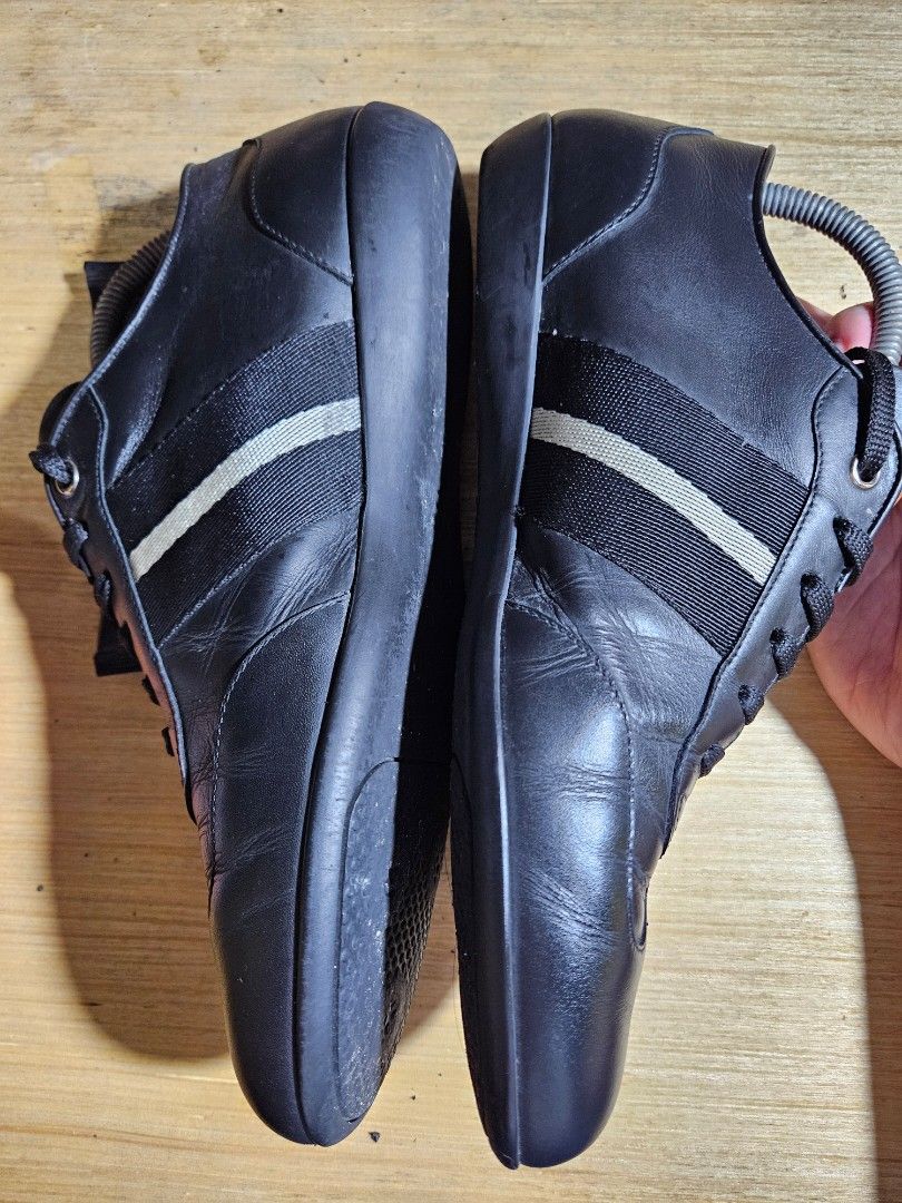 Bally Black Leather Shoes Size 8M (Category: Casual Shoes) located in Valenzuela. Submitted by _myperfectstuff (Listing ID 1455687954, Image 2). Description: - Genuine black leather Bally sneakers - Features the iconic Bally stripe detail. - Comes with original shoe trees - Perfect for both casual outings and adding a touch of class to your outfit - Timeless Bally design.