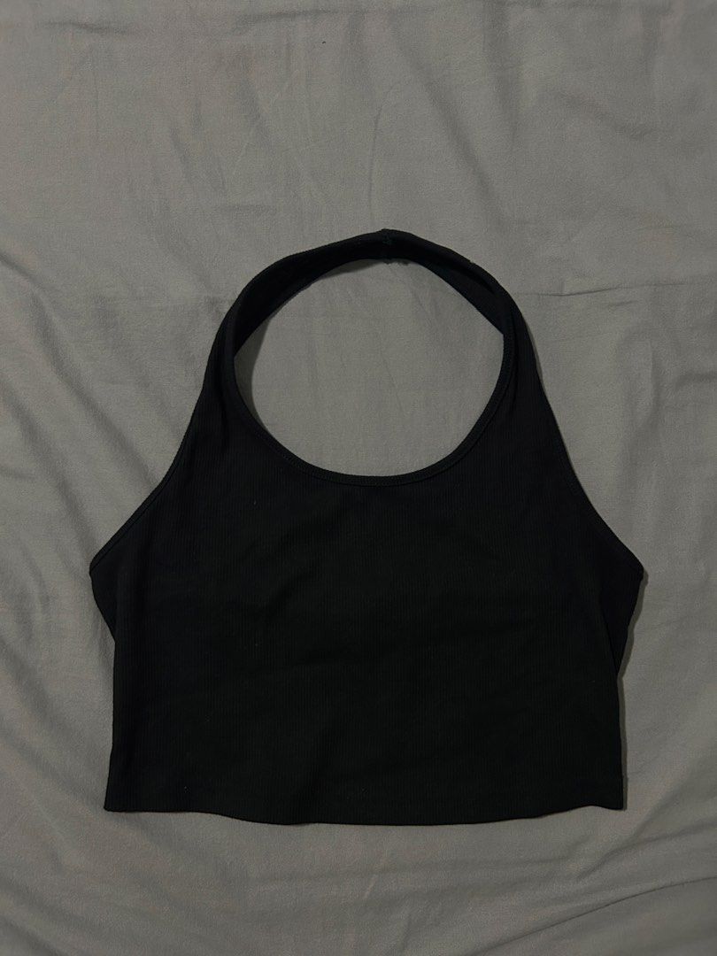 black basic halter top (Category: Sleeveless) located in Singapore. Submitted by agnolotti (Listing ID 1455807645, Image 1). Description: got from another carouseller back in the day, worn a couple times free nm, please just take it nm ONLY.