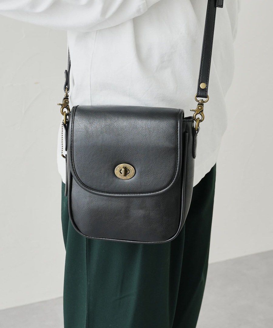 BLACK TURNLOCK CROSSBODY BAG (Category: Cross-body Bags) located in Cainta. Submitted by prebyihellop (Listing ID 1455727924, Image 3). Description: Like new No issue Good condition .