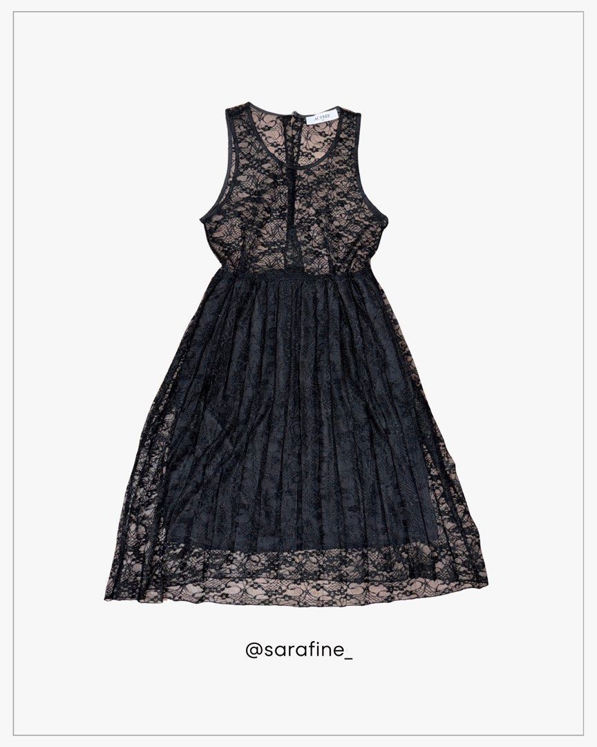 Black Lace Sleeveless Dress (Category: Dresses) located in Manila. Submitted by sarafine_ (Listing ID 1455833955, Image 1). Description: Black Lace Sleeveless Dress * Gently used and still in good condition * Black floral lace throughout * Sheer lace detail on the upper part with black fabric lining underneath the skirt * Sleeveless design with a flowy silhouette * Photos show the actual item and its current condition.