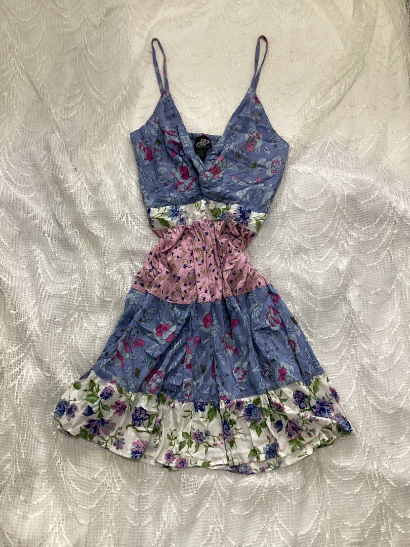 Blue Periwinkle Pink Floral Patchwork Mini Dress Spaghetti Straps (Category: Dresses) located in Alfonso. Submitted by glenngarcia03 (Listing ID 1455688043, Image 1). Description: - Adorable patchwork mini dress with adjustable strap - Features blue floral print on top and bottom - Contrasting pink floral section in the middle - Delicate spaghetti straps - Flattering sweetheart neckline - Trendy ruffled hemline - Ideal for summer outings and warm