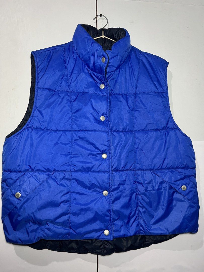 Blue Puffer Vest (Category: Vests) located in Quezon City. Submitted by ishaan1423 (Listing ID 1455706401, Image 1). Description: - Classic blue puffer vest - All-over quilted design - Button-up front - Functional pockets - Ideal for layering - Great for casual wear.