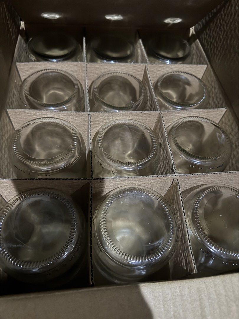 Bulk Glass Bottles for Crafting or Storage (Category: Water Bottles & Tumblers) located in Las Pinas. Submitted by emdjss (Listing ID 1455776281, Image 1). Description: - Clean, empty glass bottles ready for your projects. - Perfect for DIY crafts, homemade sauces, or storing small items. - Features a standard screw-top opening. -Without lids; P20/jar *4boxes (12jars/box) available .