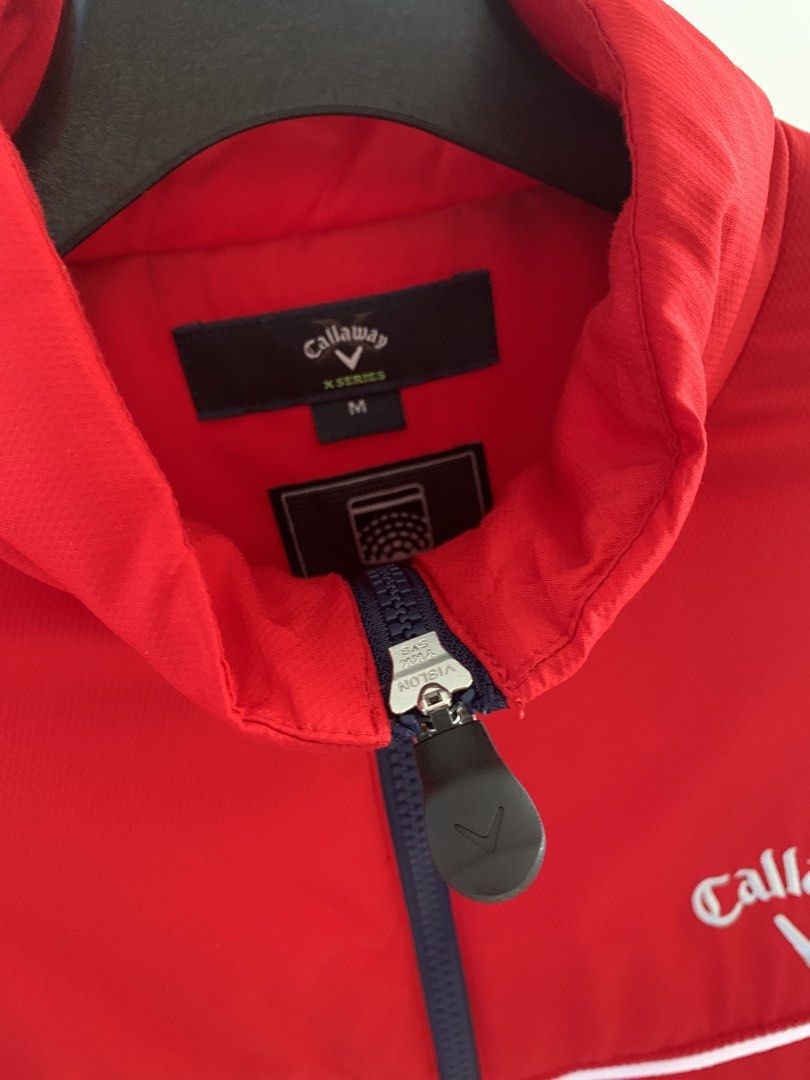 Callaway X Series Red Golf Jacket Size M (Category: Coats, Jackets and Outerwear) located in San Luis. Submitted by dialopez (Listing ID 1455725215, Image 3). Description: - Red Callaway X Series WARMSPORT jacket - Full zip front with white piping detail - Two front pockets - Size: Medium - Ideal for golf or casual wear.