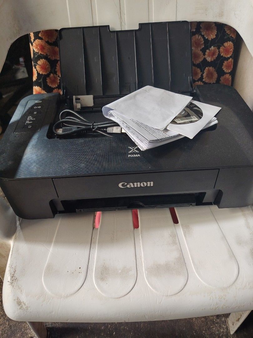 Canon Pixma TS207 - Cheap Printer (Category: Printers, Scanners & Copiers) located in Manila. Submitted by ben-dover (Listing ID 1455743600, Image 2). Description: tested and working, original price 3k no power cable included, unsure den if may ink or not kasi it has been stored since 2024 hence the dust, no damage is seen or inside just needa a bit of cleaning.