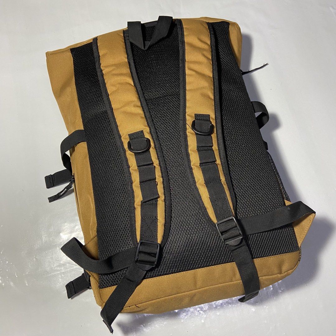 Carhartt WIP Backpack Tan Roll Top (Category: Backpacks) located in Manila. Submitted by ashiee111 (Listing ID 1455837795, Image 3). Description: - Tan Carhartt WIP backpack - Roll top design with buckle closure - Front zip pocket - Side mesh pockets - Padded straps for comfort - Internal laptop sleeve - Ideal for daily use or travel.