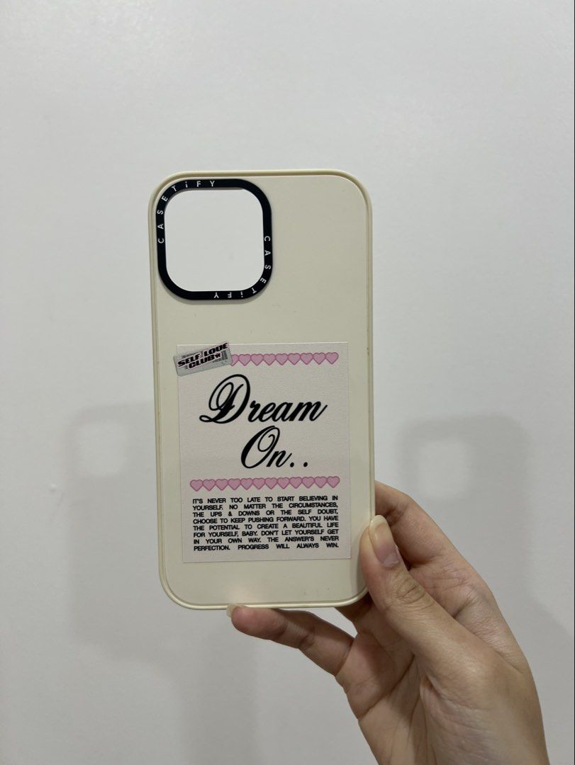 CASETiFY Dream On Self-Love Case — iPhone 13 Pro Max (Category: Cases & Sleeves) located in Manila. Submitted by chesbedumb (Listing ID 1455802670, Image 1). Description: CASETiFY “Dream On..” self-love design phone case for iPhone 13 Pro Max. - authentic CASETiFY case - “Dream On..” self-love design heart detailing - CASETiFY camera ring - good overall condition - no cracks or major damage - used but well-kept - price is negotiable! condition: h