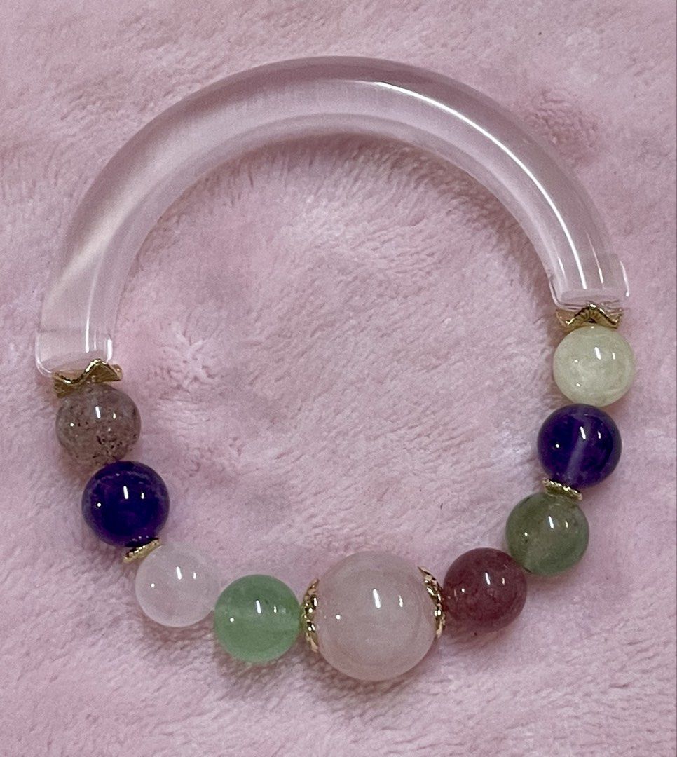 Cat’s Eye Half Bangle Bracelet (Category: Bracelets) located in Manila. Submitted by Crystal_Oracle (Listing ID 1455726814, Image 3). Description: Purple - 17cm Pink - 16cm The Cats eye gemstone is a traditional remedy for physical sickness, financial problems, stress issues, and psychic elements. This stone embraces vivid beauty like the ‘Milk and Honey’ effect, where a keen milky white ray passes through its honey-like hues in the background. T