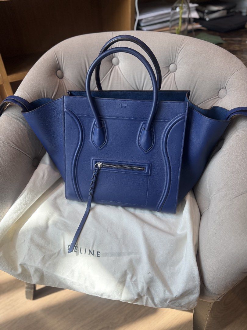 Celine Blue Phantom Bag (Category: Luxury Bags & Wallets) located in Taguig. Submitted by better_self (Listing ID 1455742314, Image 2). Description: Excellent condition! Well preserved and hard to find in this condition. Authentic Celine. Spacious with zip pocket. Top handles. Perfect for any occasion. Includes dust bag..