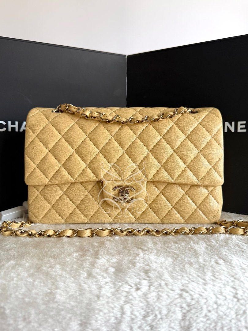 Chanel Medium Double Flap GHW in Quilted Beige Caviar (Category: Luxury Bags & Wallets) located in Paranaque City. Submitted by belles_lux_closet (Listing ID 1455767111, Image 2). Description: AUTHENTIC MEDIUM DOUBLE FLAP GOLD HARDWARE IN QUILTED BEIGE CAVIAR LEATHER (Microchipped) ✅ 100% Guaranteed Authentic ✅ Microchipped ✅ Mint Condition, Rank A-SA ✅ Comes with dust bag and authenticity certificate! ✅ Retails at ~Php 650,000 in-stores. Selling
