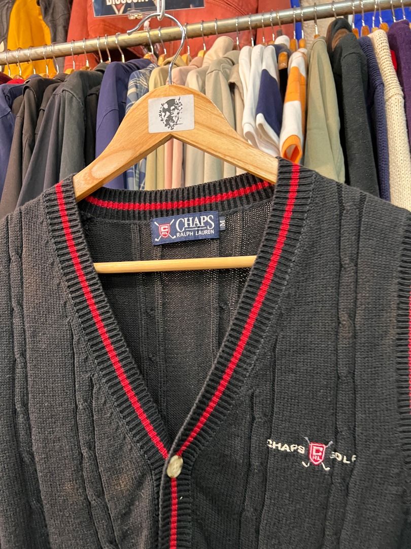 Chaps by Ralph Lauren Black Knit Button Vest (Category: Vests) located in Baguio. Submitted by marcusmartin2600 (Listing ID 1455723379, Image 2). Description: Size: Medium on tag Condition: Excellent | signs of usage 📏 Measurement via Tape Measure (in inches): Chest width: 20” Length: 25” Shoulders: 16” Hem: 18.5”.