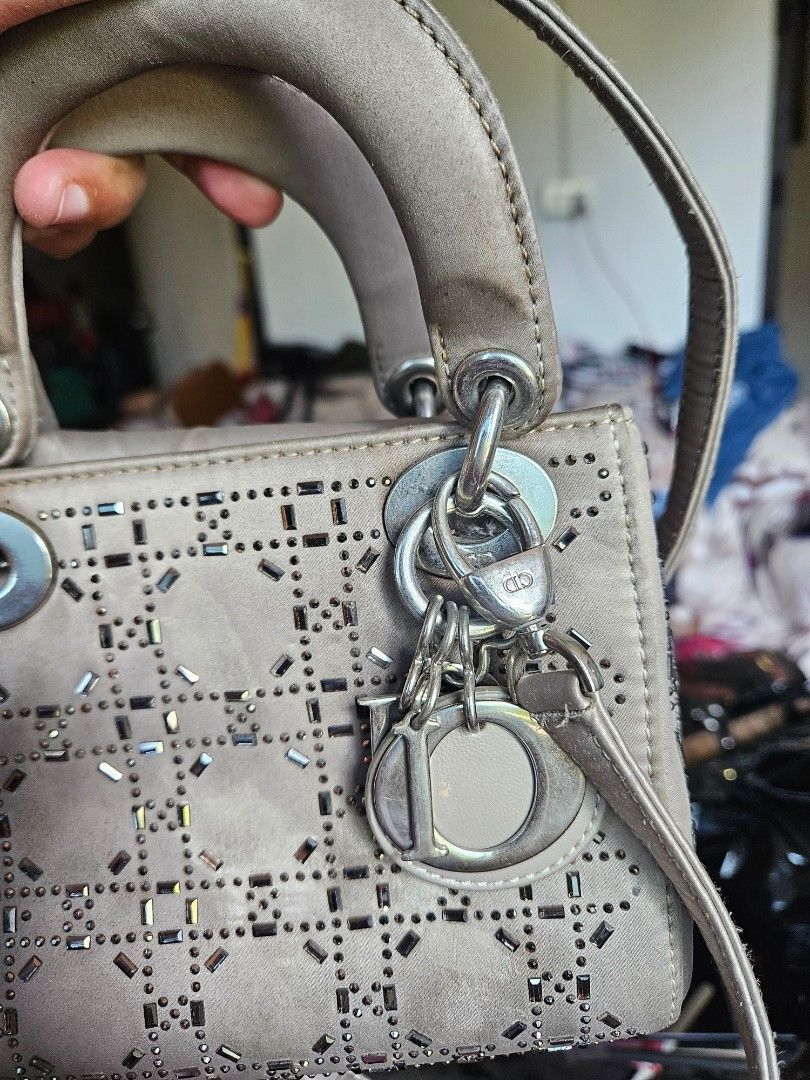 Christian Dior Cannage Studded Handbag (Category: Luxury Bags & Wallets) located in Manila. Submitted by clayd052 (Listing ID 1455692064, Image 2). Description: - Christian Dior handbag - Iconic cannage pattern with stud embellishments - Top handles and detachable shoulder strap - Interior zippered pocket - Minor signs of wear on handles and hardware - A classic, timeless piece NGA.