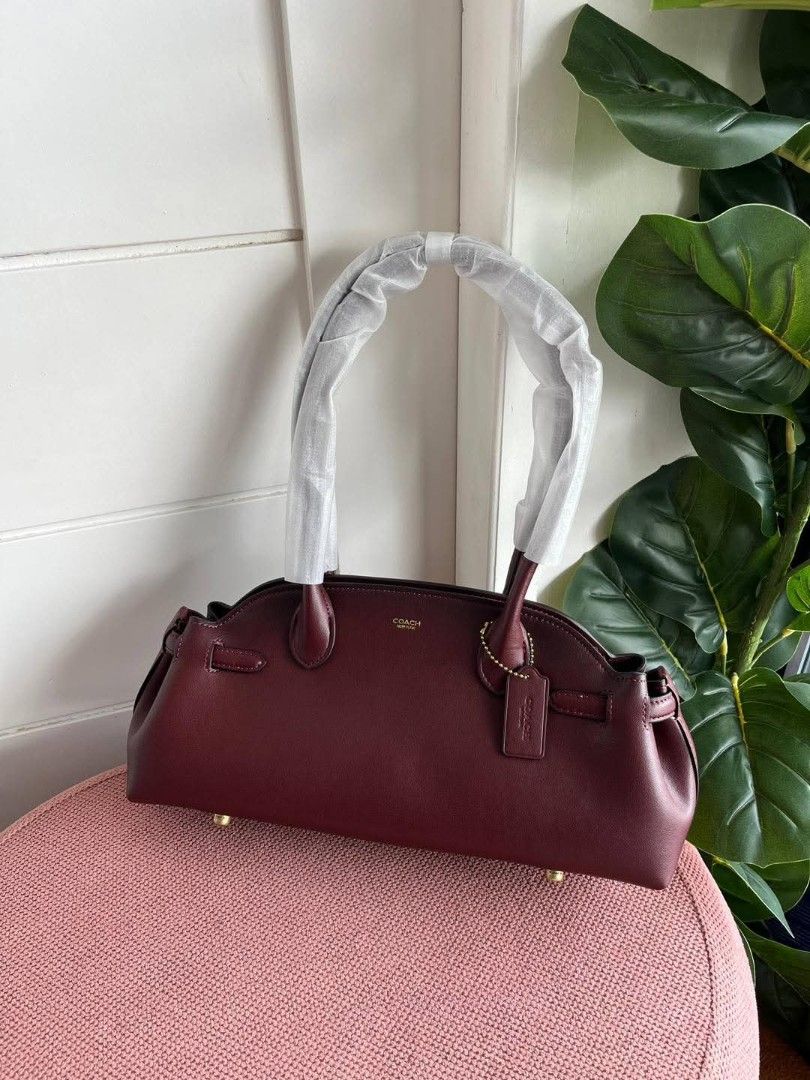 Coach Empire Carryall 34 (Category: Shoulder Bags) located in Quezon City. Submitted by bagsboutiqueph (Listing ID 1455825979, Image 2). Description: LAST PRICE POSTED. LIMITED STOCKS! BRANDNEW WITH INCLUSIONS. COLOR MAY SLIGHTLY VARY IN ACTUAL DUE TO LIGHTING AND CAMERA SETTING. OTHER PHOTOS WILL BE SEND DURING PURCHASE AND FOR SURE BUYERS ONLY. WHEN IN DOUBT, DO NOT ORDER. THANK YOU..