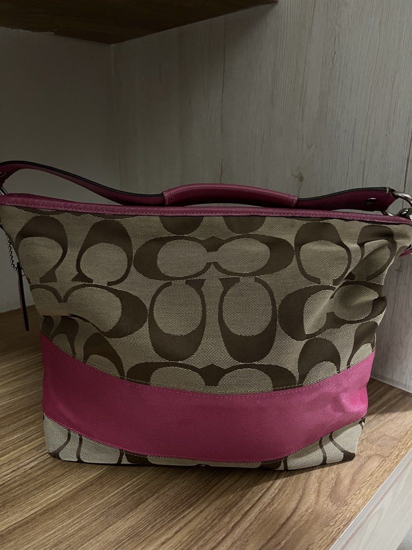 Coach Pink Stripe Hobo bag (Category: Luxury Bags & Wallets) located in Meycauayan. Submitted by preloved_clothes_by_kath (Listing ID 1455781280, Image 2). Description: - Authentic Coach monogram canvas shoulder bag - No issues -Decluttering - Condition 9/10.