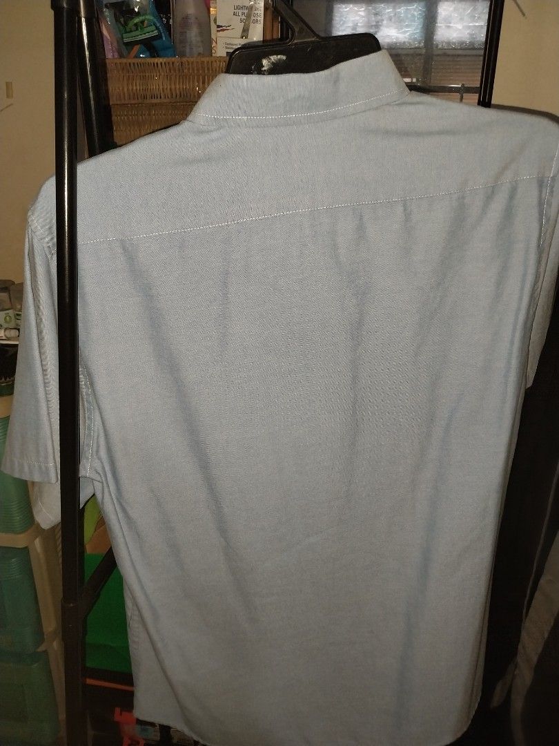 Coco Republic Light Blue Short Sleeve Button Up Shirt Size M (Category: Shirts) located in Paranaque City. Submitted by MDC_rocks (Listing ID 1455826695, Image 2). Description: Light blue short sleeve shirt from Coco Republic. Has a chest pocket and wooden-style buttons. Tagged size M. Great for casual wear or smart casual outfits. Simple and classic design..